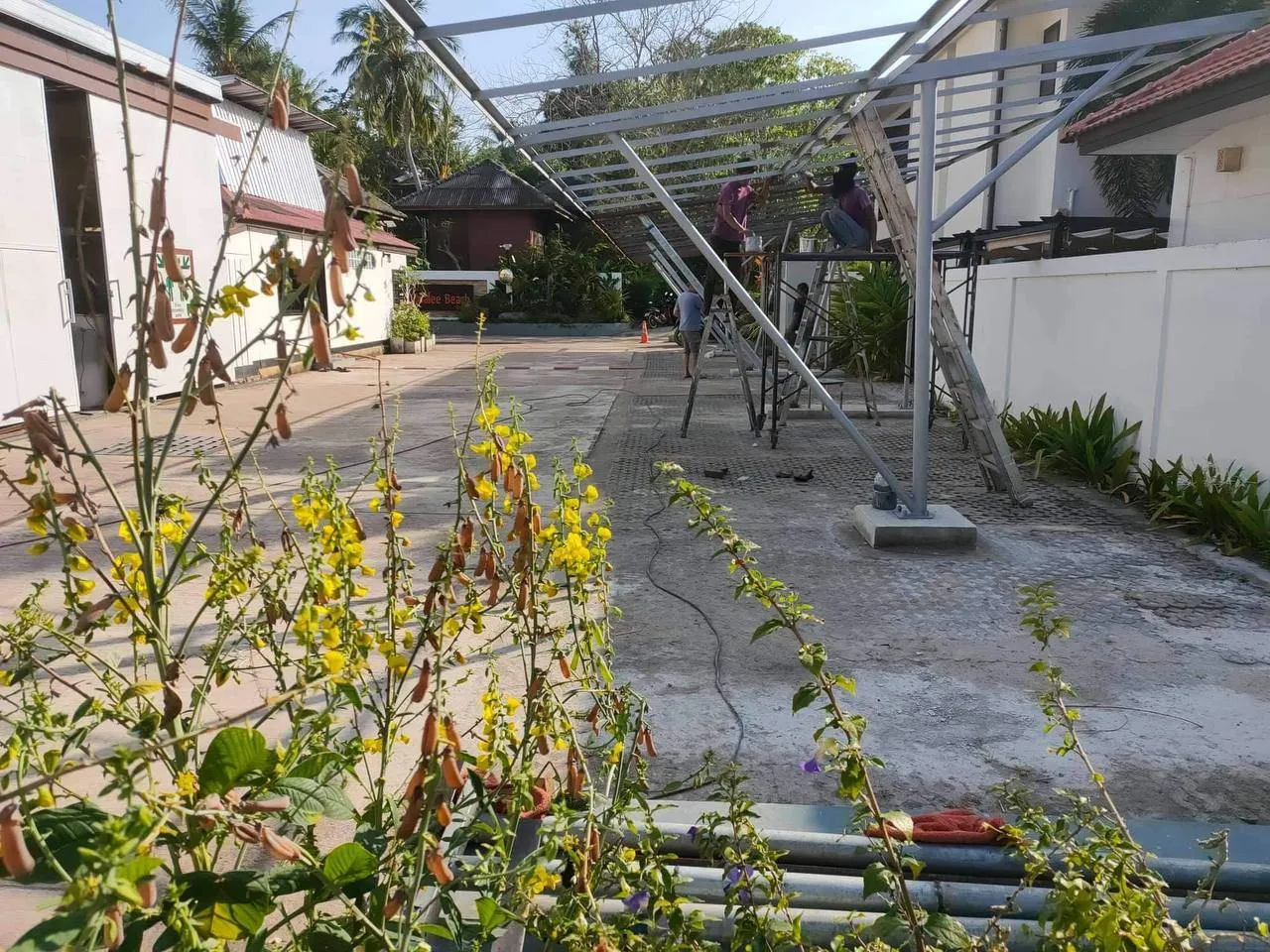 Solar carport installation in Koh Lanta Thailand supporting daytime water pump loads