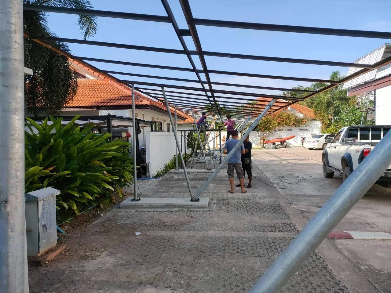 Solar carport installation in Koh Lanta Thailand supporting daytime water pump loads